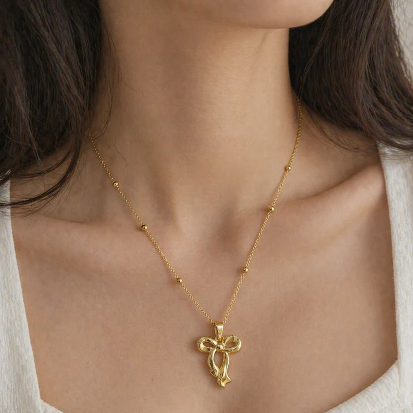 Elegant Golden Bow Pendant Necklace