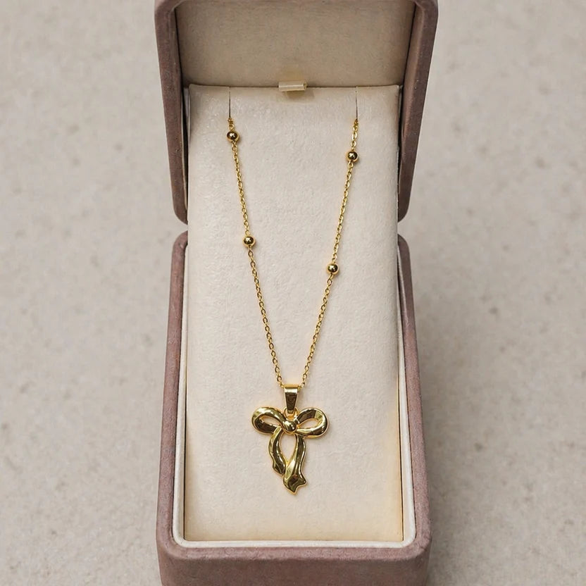 Elegant Golden Bow Pendant Necklace