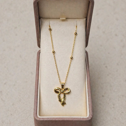 Elegant Golden Bow Pendant Necklace